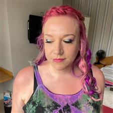 Pink haired bride with rainbow colour eyeshadow