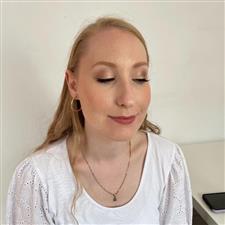 Shimmery champagne eyeshadow on blonde woman